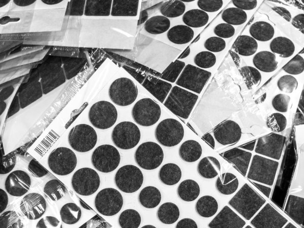 Packages of non-scratch furniture pads