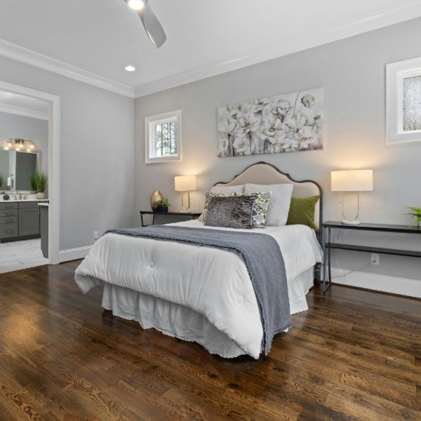 Hardwood flooring in a spacious bedroom