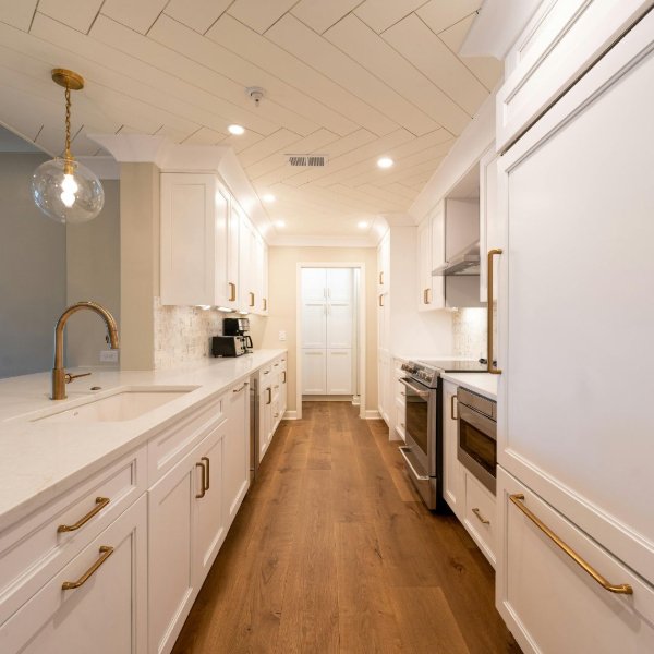 Brown laminate flooring in a stylish kitchen
