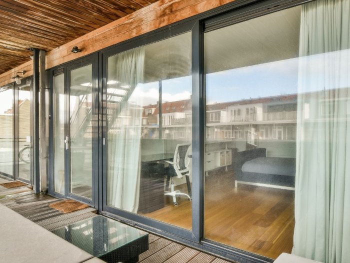 Home with patio and sliding glass doors