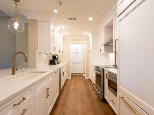 Brown laminate flooring in a stylish kitchen